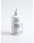 White pump bottle of hand and body wash with camellia and grapefruit, ILM Skincare lotion branding