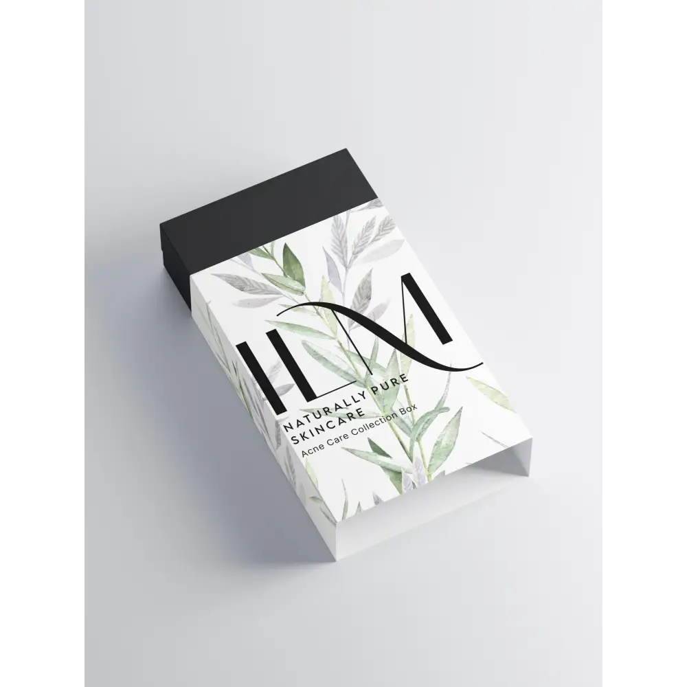 Acne care collection box with stylized botanical design and ILM lettering on cover.